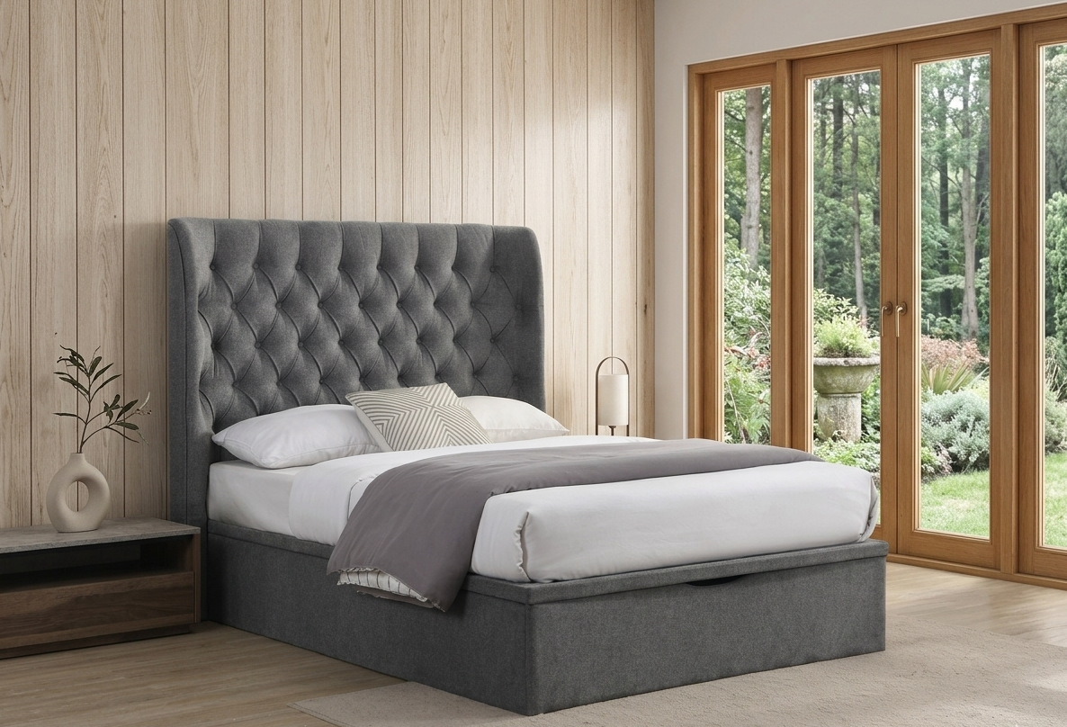 Clara gas lift storage bed in chic Grey fabric, featuring a beautifully tufted buttoned headboard in a bright, minimalist bedroom setting at the furniture store ni