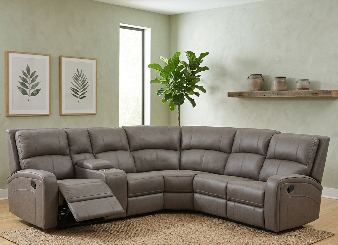 Gray sectional sofa in a living room with greenery and decor at furniture store ni