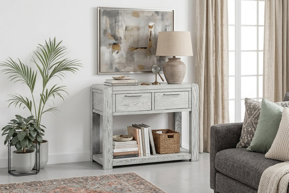 Amsterdam grey washed oak 2-drawer console table showcasing its 100cm wide surface, subtle grey-washed oak grain finish, and two front drawer at the furniture store ni