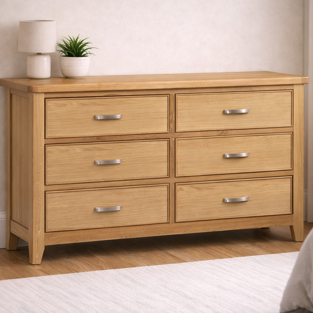 Wooden dresser with six drawers in a bedroom setting at the furniture store ni