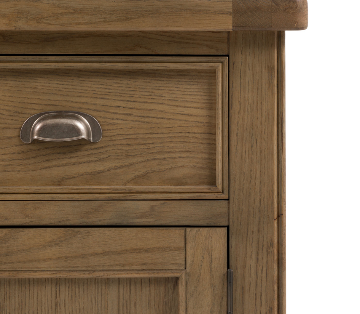 Hardwick large 3-door 3-drawer oak sideboard showcasing its expansive horizontal profile, warm natural wood grain finish, and classic metal handles at the furniture store ni