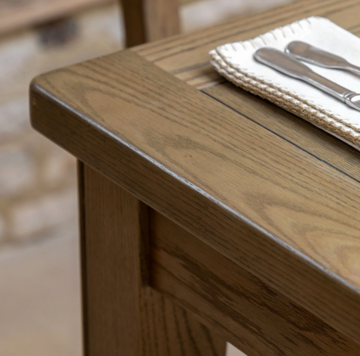 Hardwick extending oak dining table in its standard form, close up at the furniture store ni