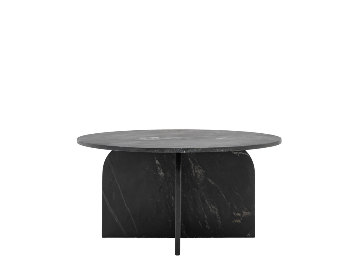 Round black marble table on a white background