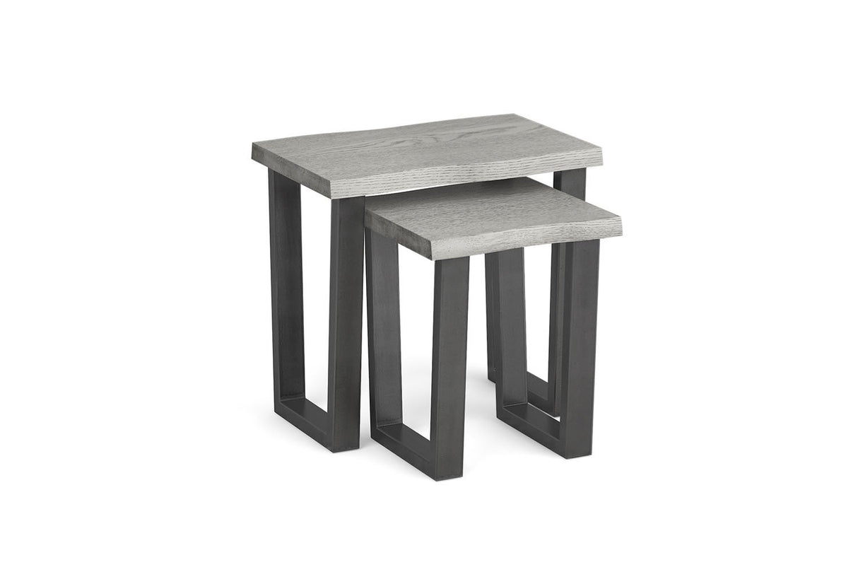 A pair of nesting side tables with light gray wood-grain tops and dark charcoal metal legs, shown on a plain white background.
