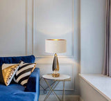 Lyra Sculptural Gold and Black Table Lamp