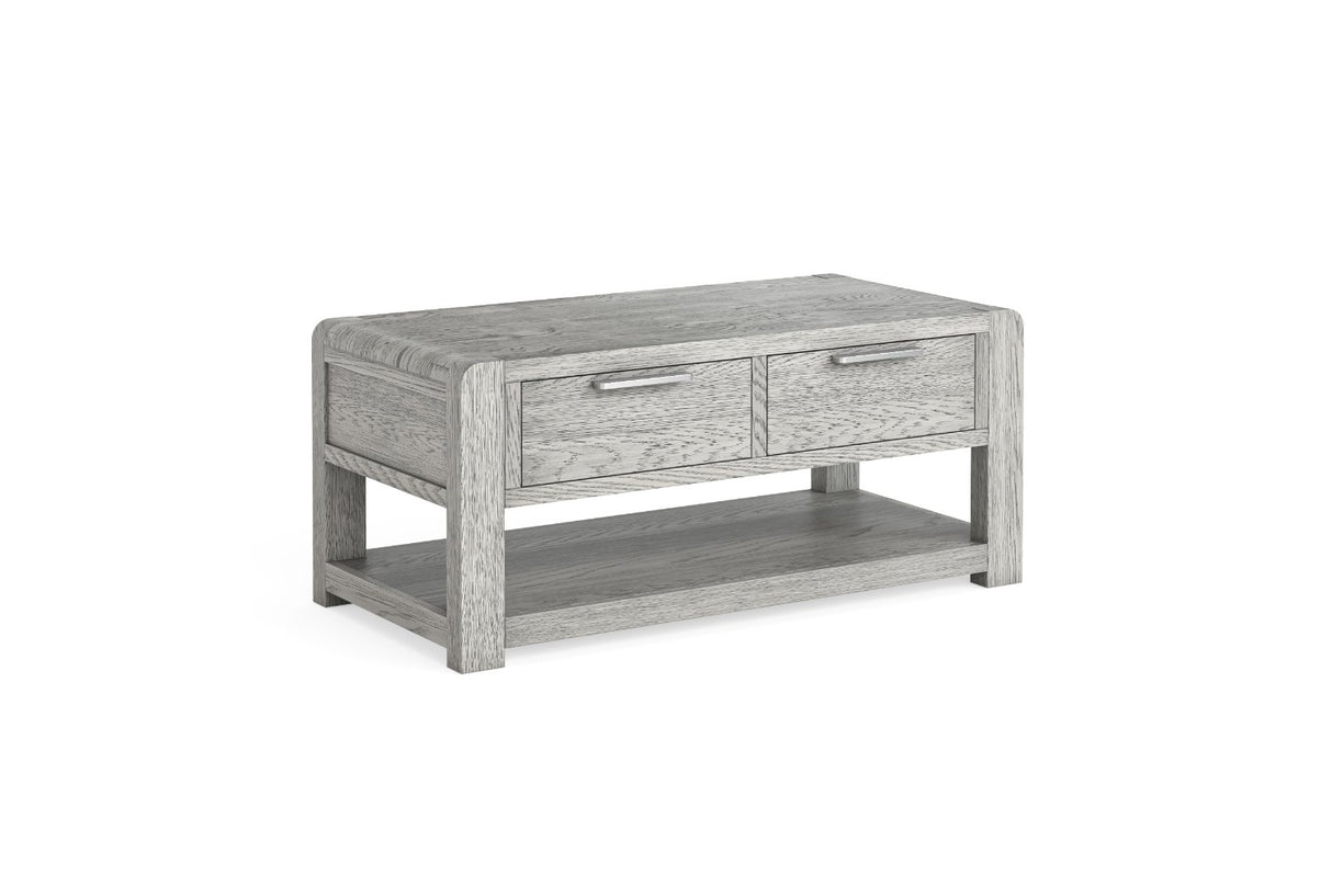 A light gray wood coffee table with two drawers and an open lower shelf, shown on a plain white background.