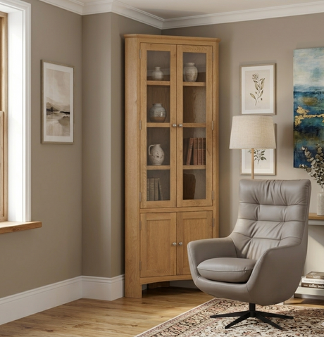 Orbit Luxury Swivel Chair upholstered in premium, rich bisque genuine leather, showcasing its high-back cushioned design and sleek black star swivel base at furniture store ni
