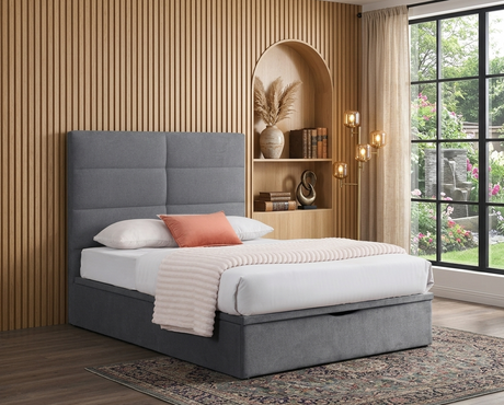 Jessica gas lift storage bed in chic Grey fabric, featuring a sleek, minimalist plain headboard in a contemporary, sunlit bedroom at the furniture store ni