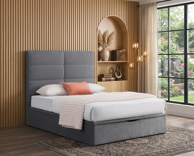 Jessica gas lift storage bed in chic Grey fabric, featuring a sleek, minimalist plain headboard in a contemporary, sunlit bedroom at the furniture store ni