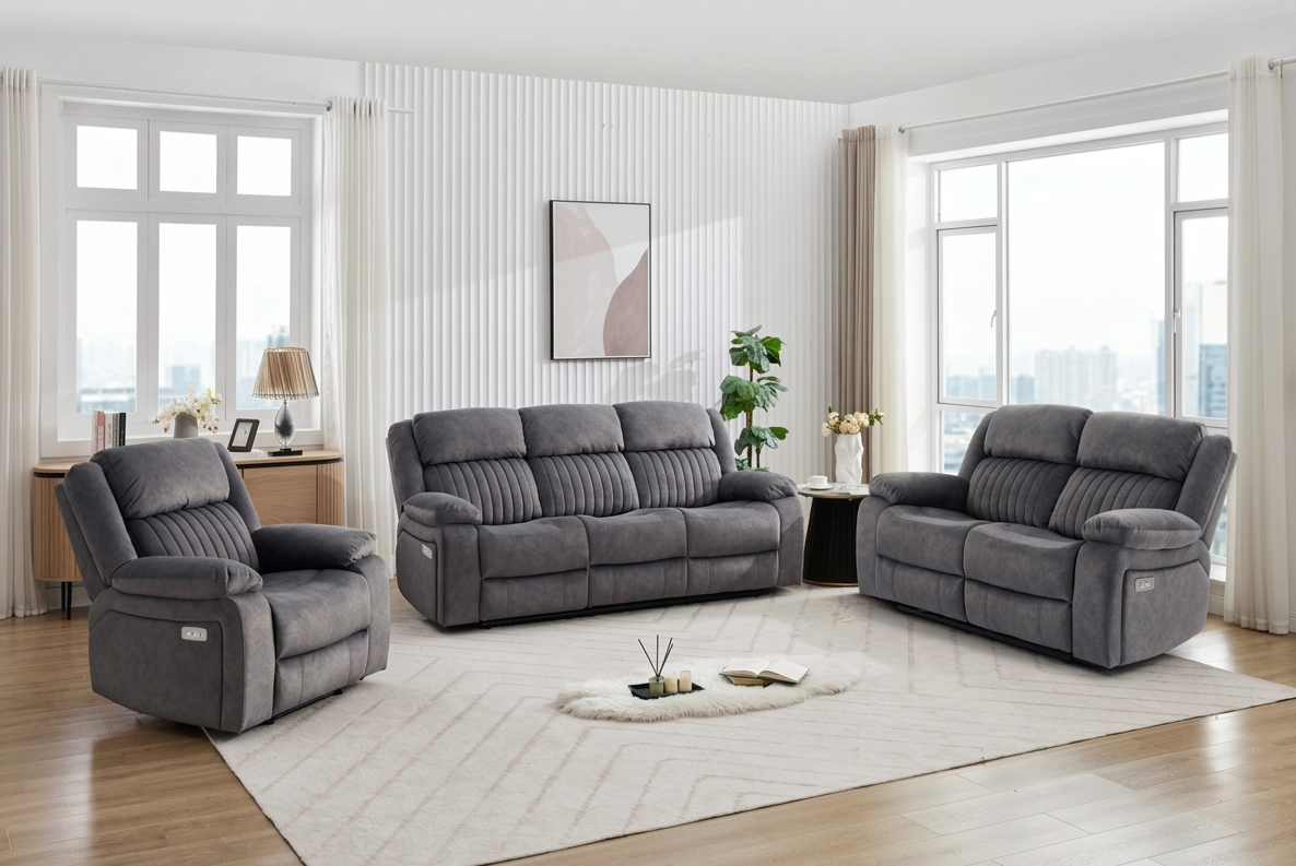 Morgan Electric reclining suite in Slate Grey fabric, featuring a 3-seater sofa and two armchairs in a professionally styled, minimalist living room at the furniture store ni.