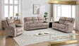 Morgan Electric reclining suite in Taupe fabric, featuring a 3-seater sofa and two armchairs in a professionally styled, minimalist living room at the furniture store ni.