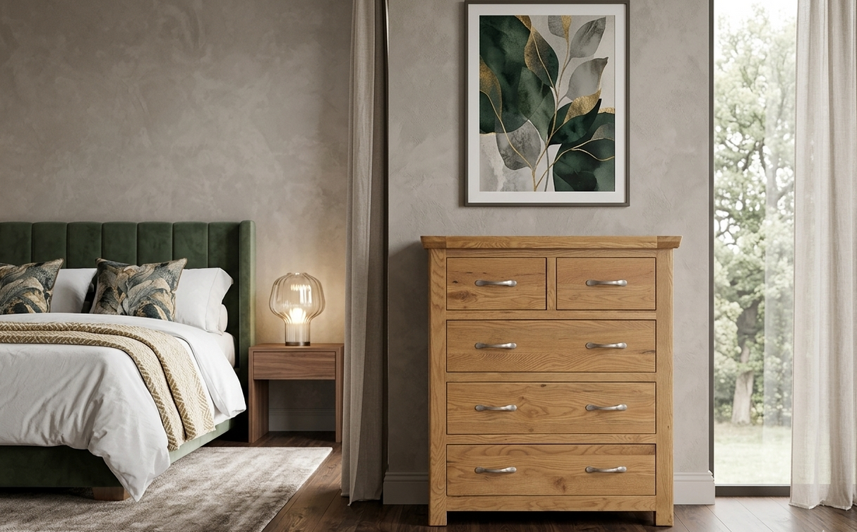 manhattan oak dresser in a bedroom with a bed and lamp in the background at the furniture store ni