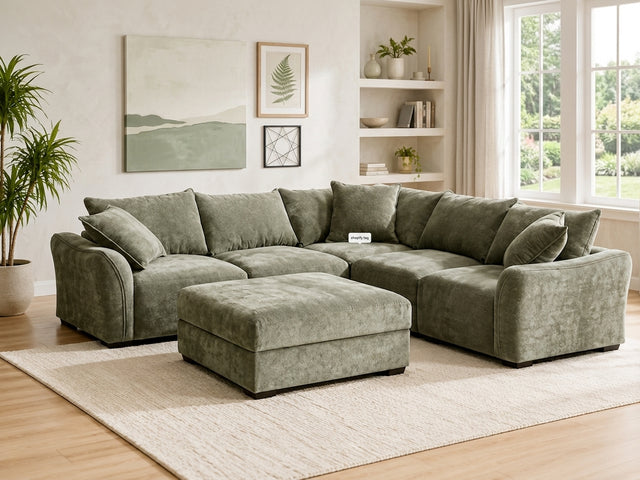 Bowman modular sofa system configured as a large corner sectional in on-trend green fabric with matching scatter cushions at the furniture store ni