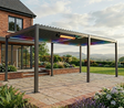 Titan 6x3m Aluminium Pergola in Graphite Grey installed on a modern patio at the furniture store ni