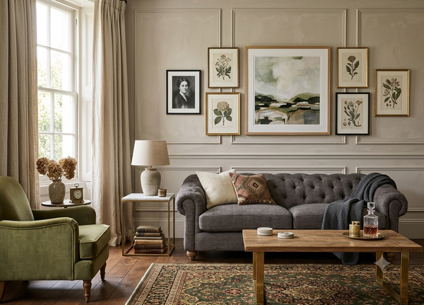 Modern 3-seater Chesterfield sofa showcasing its deep-buttoned back, in Celine wishing well, elegant scrolled arms, and gracefully contoured silhouette sitting on solid ash legs at the furniture store ni 