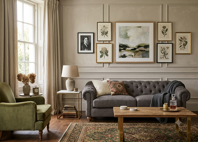 Modern 3-seater Chesterfield sofa showcasing its deep-buttoned back, in Celine wishing well, elegant scrolled arms, and gracefully contoured silhouette sitting on solid ash legs at the furniture store ni 