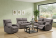 Gray silverton reclining sofa set in a living room with a coffee table and decor at furniture store ni