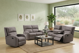 Gray silverton reclining sofa set in a living room with a coffee table and decor at furniture store ni