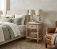 Artisan 1-drawer bedside table showcasing its exquisite hand-crafted bobbin turned legs, premium oak wood grain, and a subtle lime wash finish at the furniture store ni