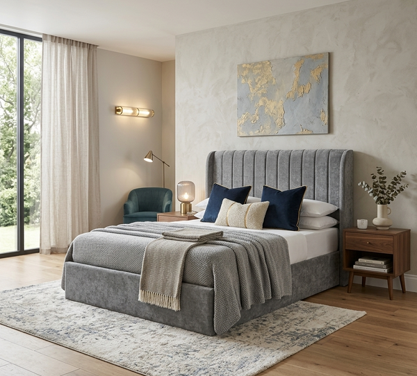 Frida storage bedframe in grey plush fabric, showcasing an elegant wingback headboard with vertical lines and a gas-lift base at the furniture store ni
