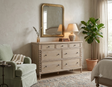 Artisan 7-drawer wide chest showcasing its exquisite hand-crafted bobbin turned frame details, premium oak wood grain, and a subtle lime wash finish at the furniture store ni