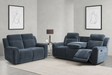 Somerton manual reclining suite in sleek Dark Grey fabric, styled in a minimalist, modern living room  at the furniture store ni