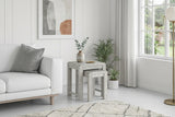 Amsterdam grey washed oak nest of tables arranged together, highlighting their subtle grey-washed wood grain finish and clean nesting design at the furniture store ni
