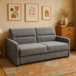 Hampton Grey Sofa Bed in a modern living room setting at the furniture store ni