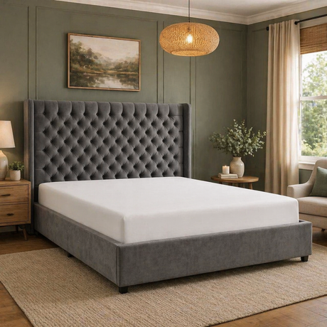 Colette ottoman storage bed in plush dark grey fabric, featuring a button-tufted wingback headboard at furniture store ni