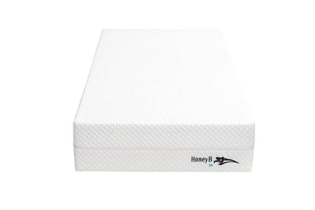 Ice double-sided foam mattress with cool-touch fabric, presented in a bright, modern bedroom furniture store ni