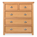 Newbury Wooden dresser with five drawers and metal handles on a white background