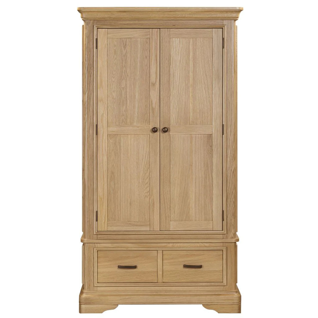 furniture store ni Oslo 2-door wardrobe in a light oak finish, featuring a thick tiered-top, robust plinth base, and contemporary hardware in a stylish bedroom setting.