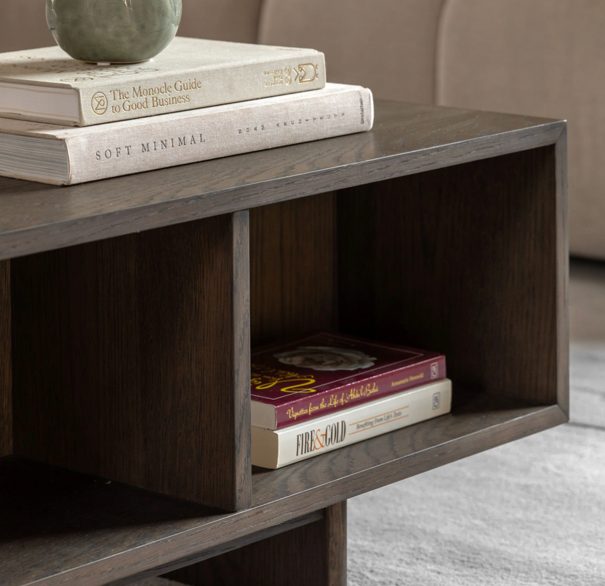 Wooden shelf with books and a plant on top, in a home setting at the furniture store ni
