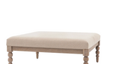 Beige coffee table with wooden legs on a white background