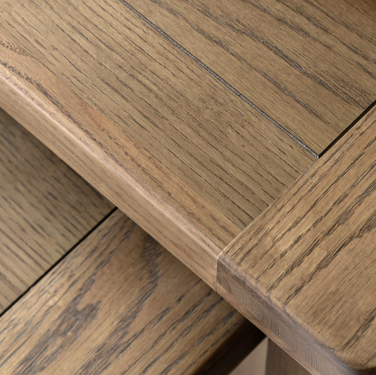 Hardwick nest of 2 tables showcasing their warm natural oak wood grain finish, clean classical lines, and robust solid frame construction at the furniture store ni