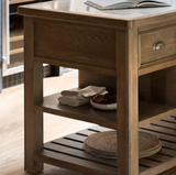 Hardwick large oak kitchen island showcasing its premium, durable marble countertop, warm wood grain finish, and multiple open storage shelves.