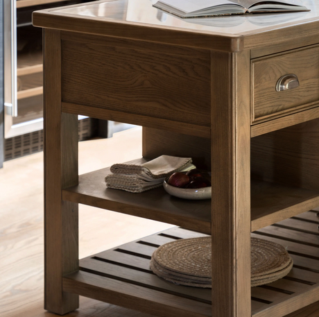 Hardwick large oak kitchen island showcasing its premium, durable marble countertop, warm wood grain finish, and multiple open storage shelves.