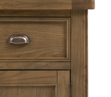 Hardwick large 3-door 3-drawer oak sideboard showcasing its expansive horizontal profile, warm natural wood grain finish, and classic metal handles at the furniture store ni