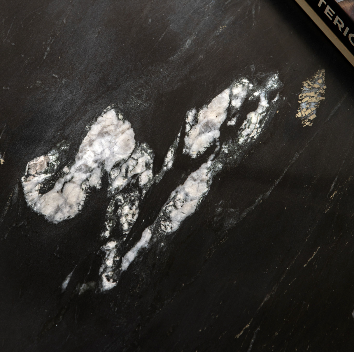 Close-up of black Amalfi marble table