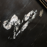 Close-up of black Amalfi marble table