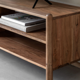 Wooden shelf on Cannes unit with books on a neutral background at the furniture store ni