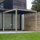 Nova Titan pergola in a Light Oak finish featuring adjustable louvres, set in a modern garden patio with natural wood surroundings. furniture store ni