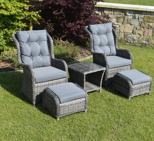 Sorrento bistro garden set including two rattan armchairs with grey cushions, matching stools, and a side table with a storage shelf at the furniture store ni